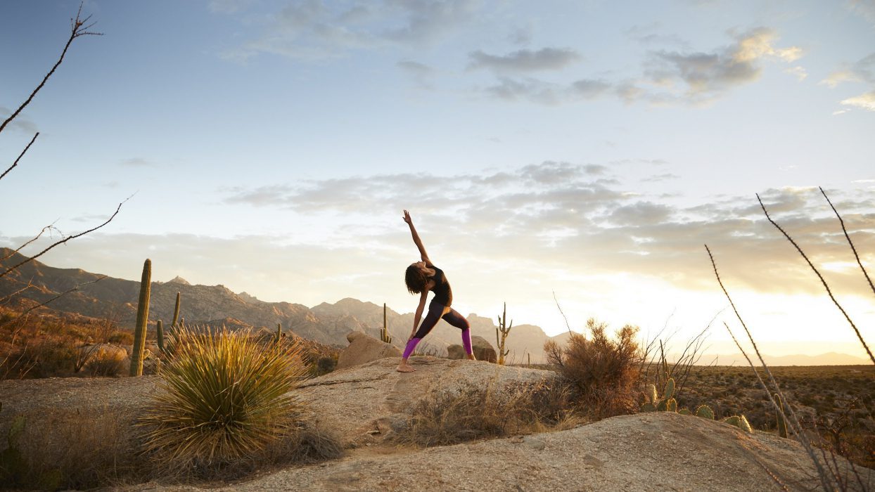 person doing yoga outside