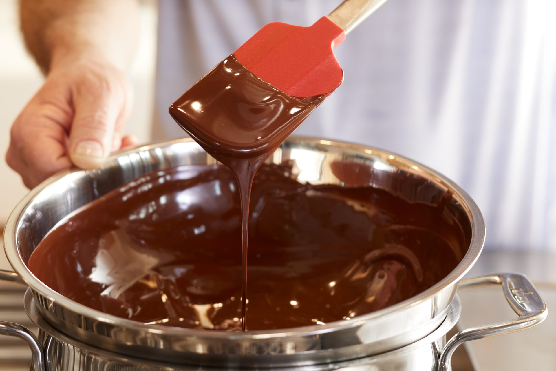 melted chocolate in a bowl with spoon 