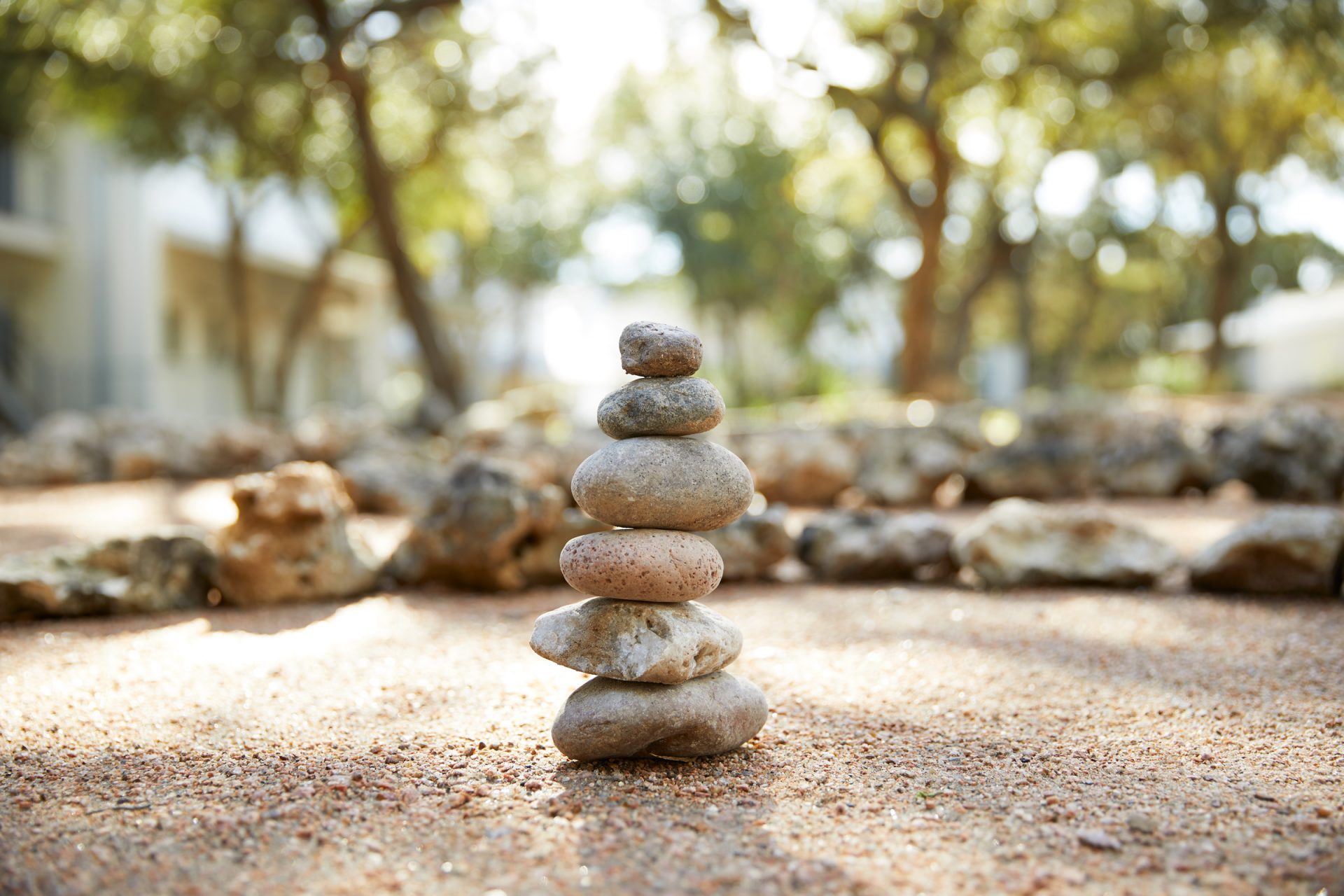 Balanced stones in sand