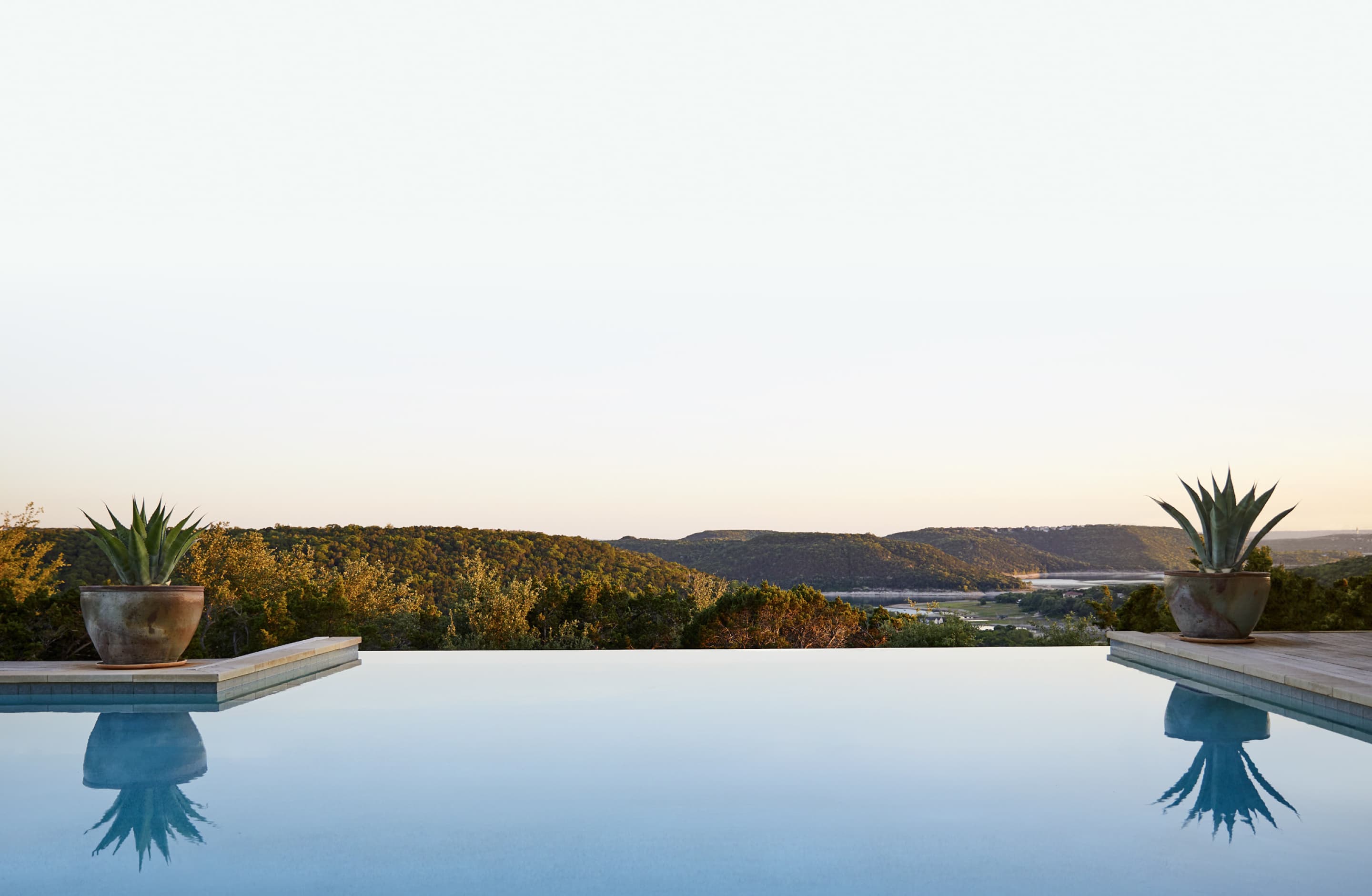 view of landscape from pool