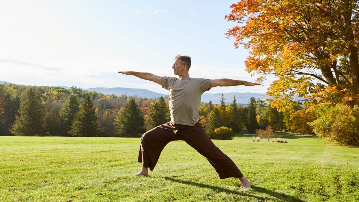 person doing yoga outside