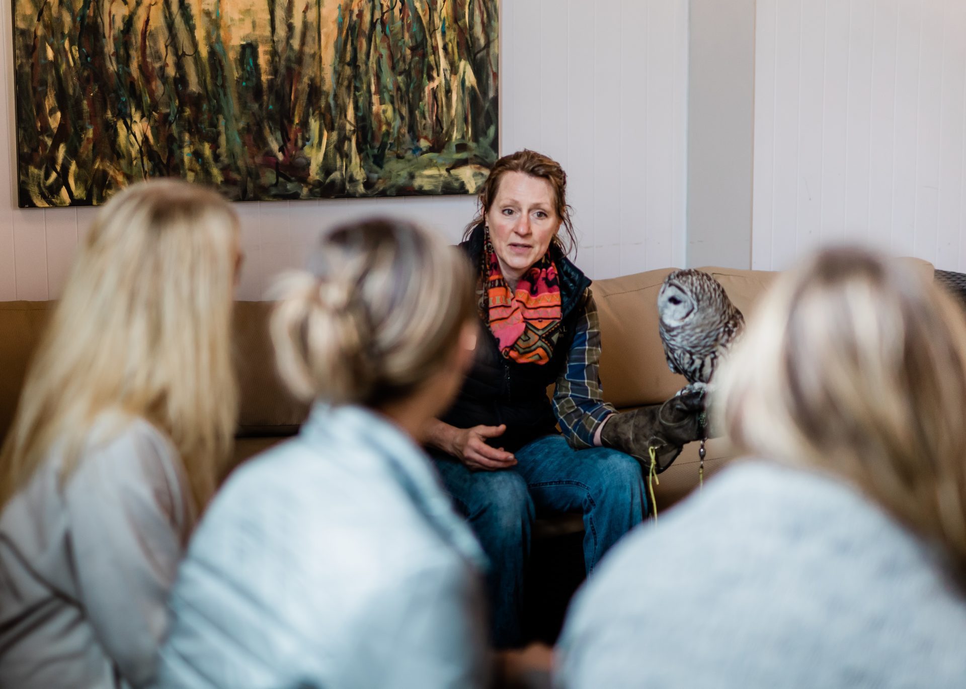 group of women listening to therapist