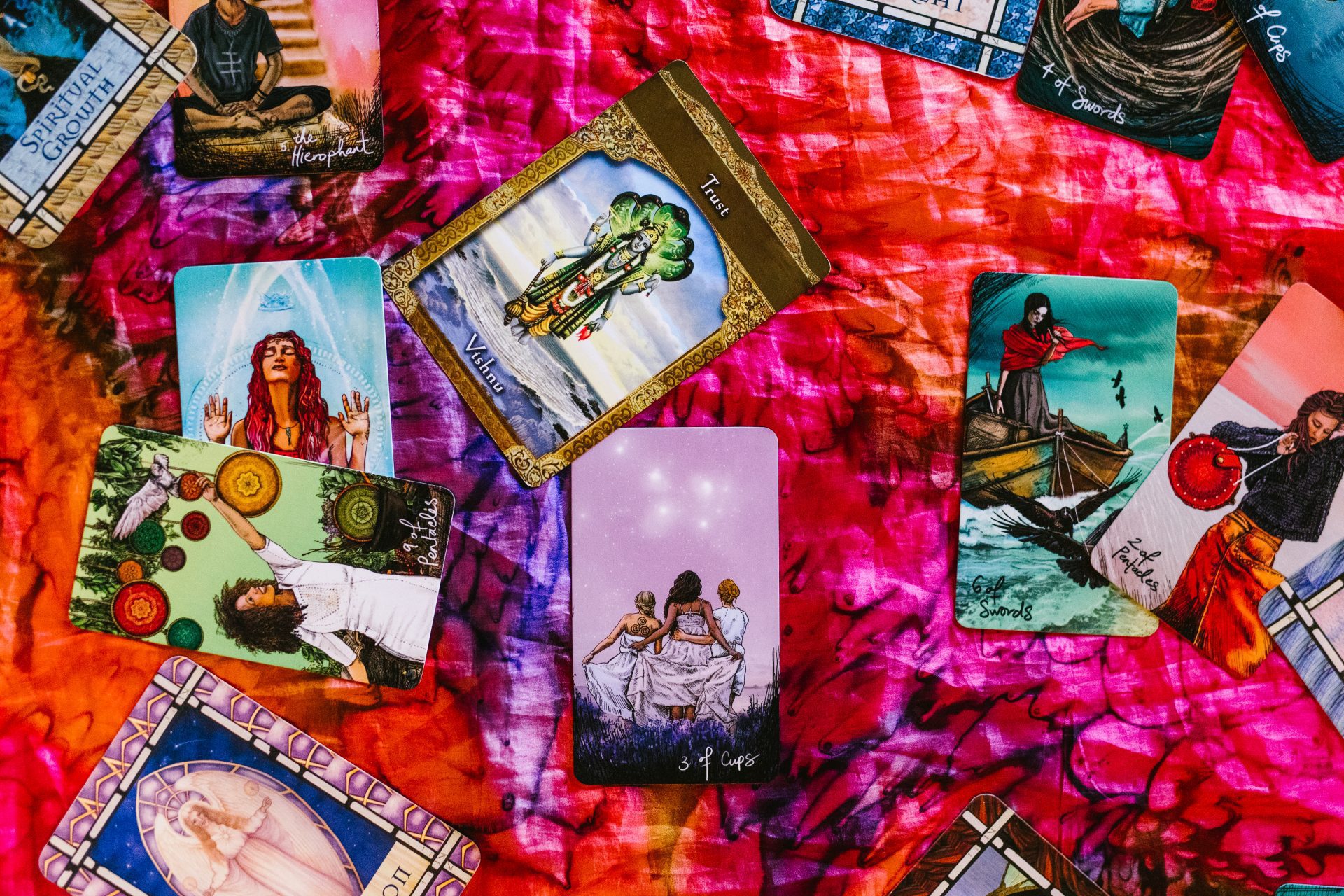 Tarot cards on colourful blanket