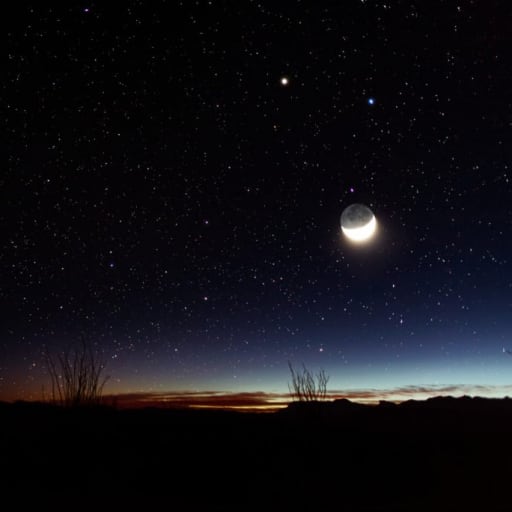 view of night sky and bright moon