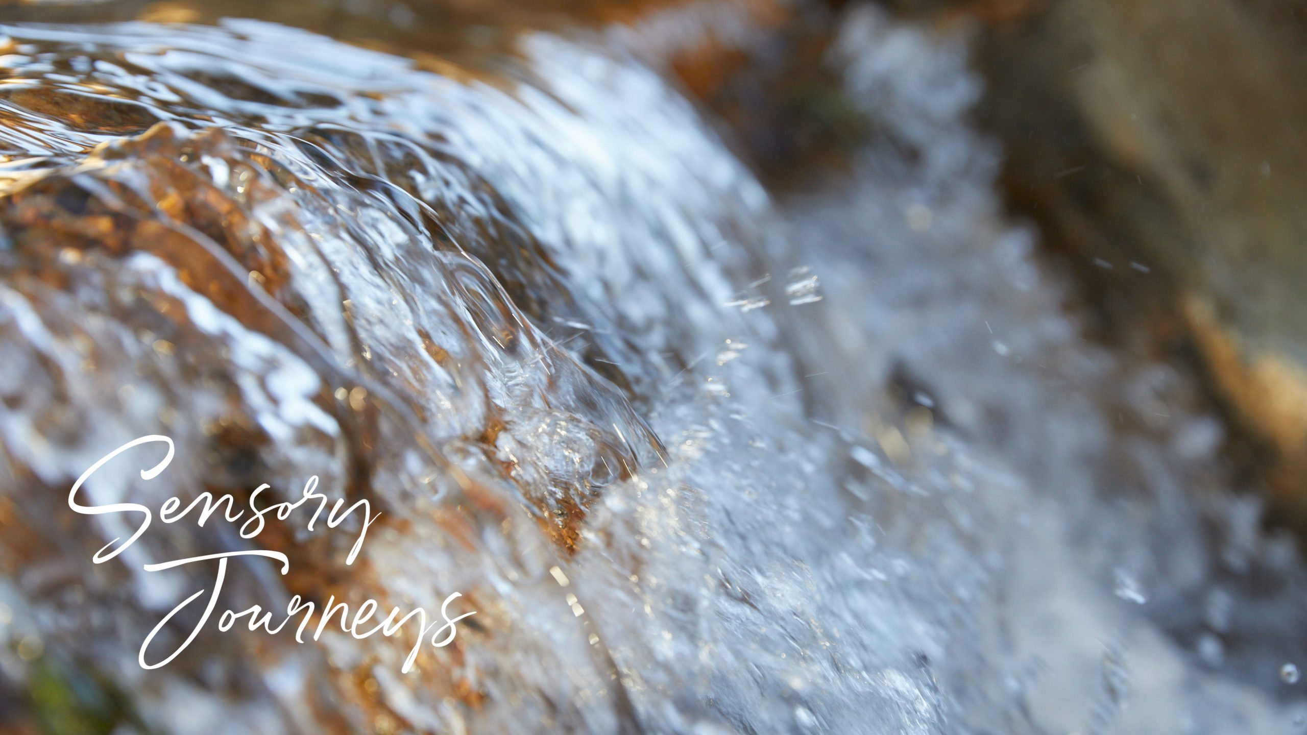 water flowing down rocks