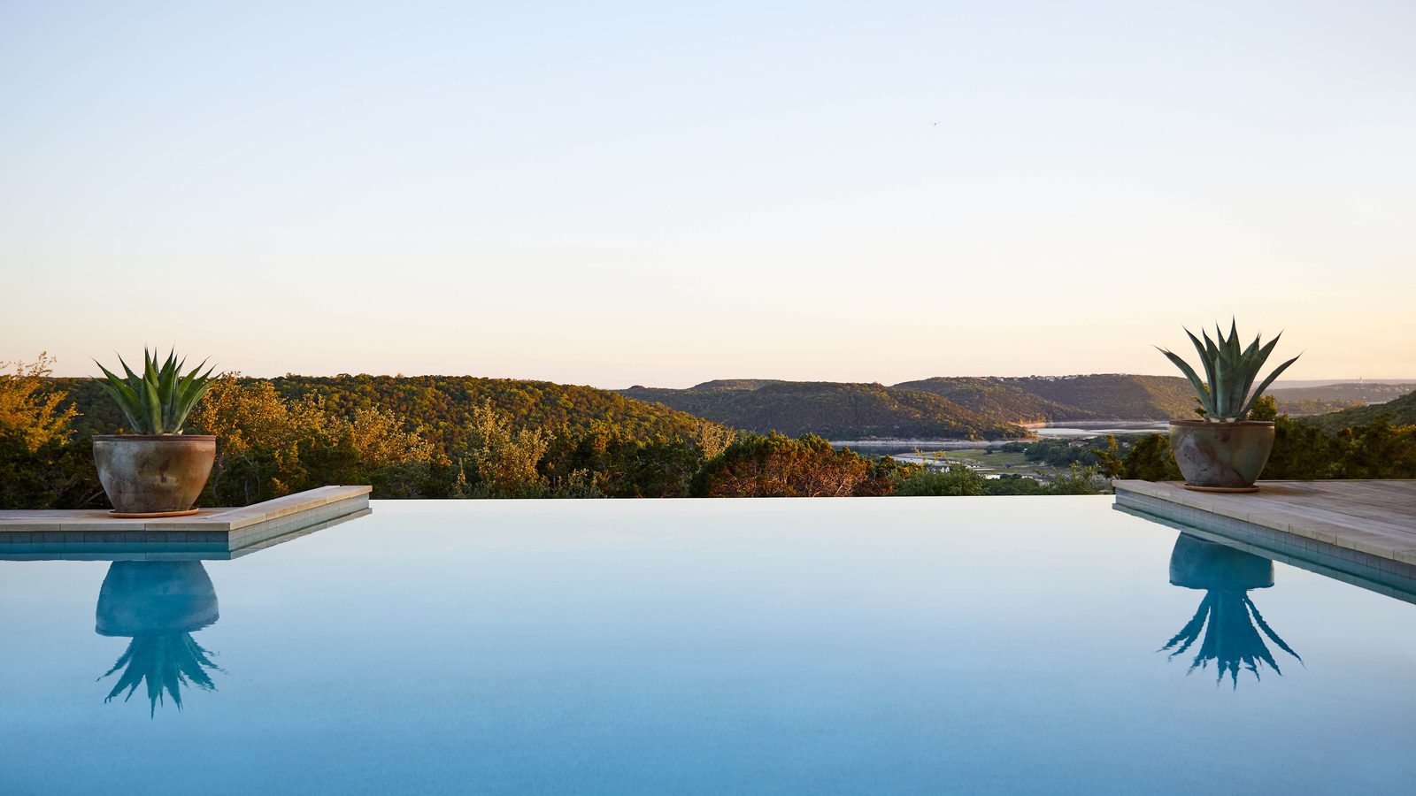 view of landscape from pool